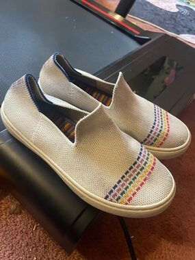 Rothy's Kids Slip-On Sneakers in Natural with Rainbow Accents